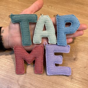 Buchstabe Schlüsselanhänger